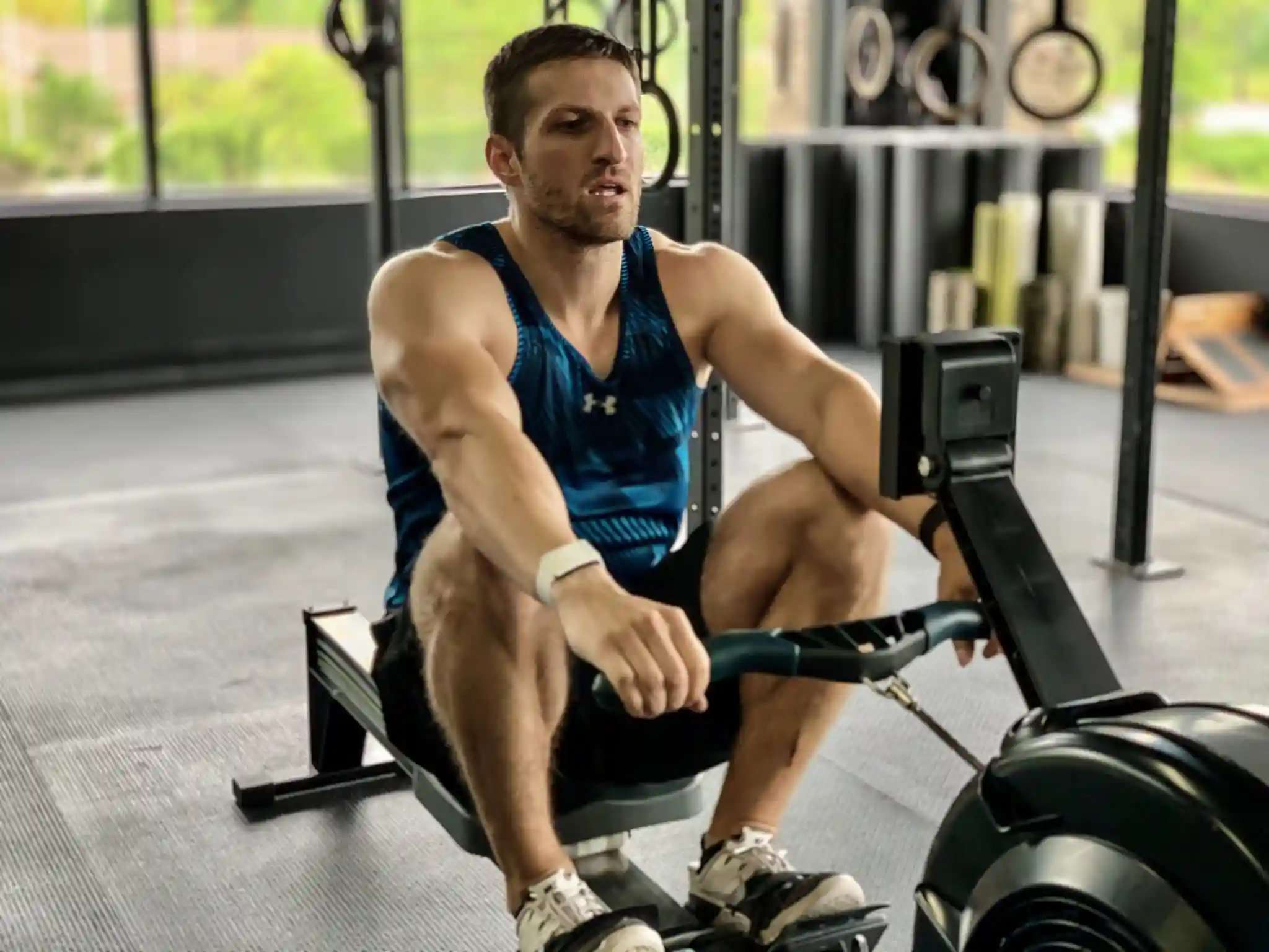 Michael Kummer does a light workout on the rower with WHOOP.